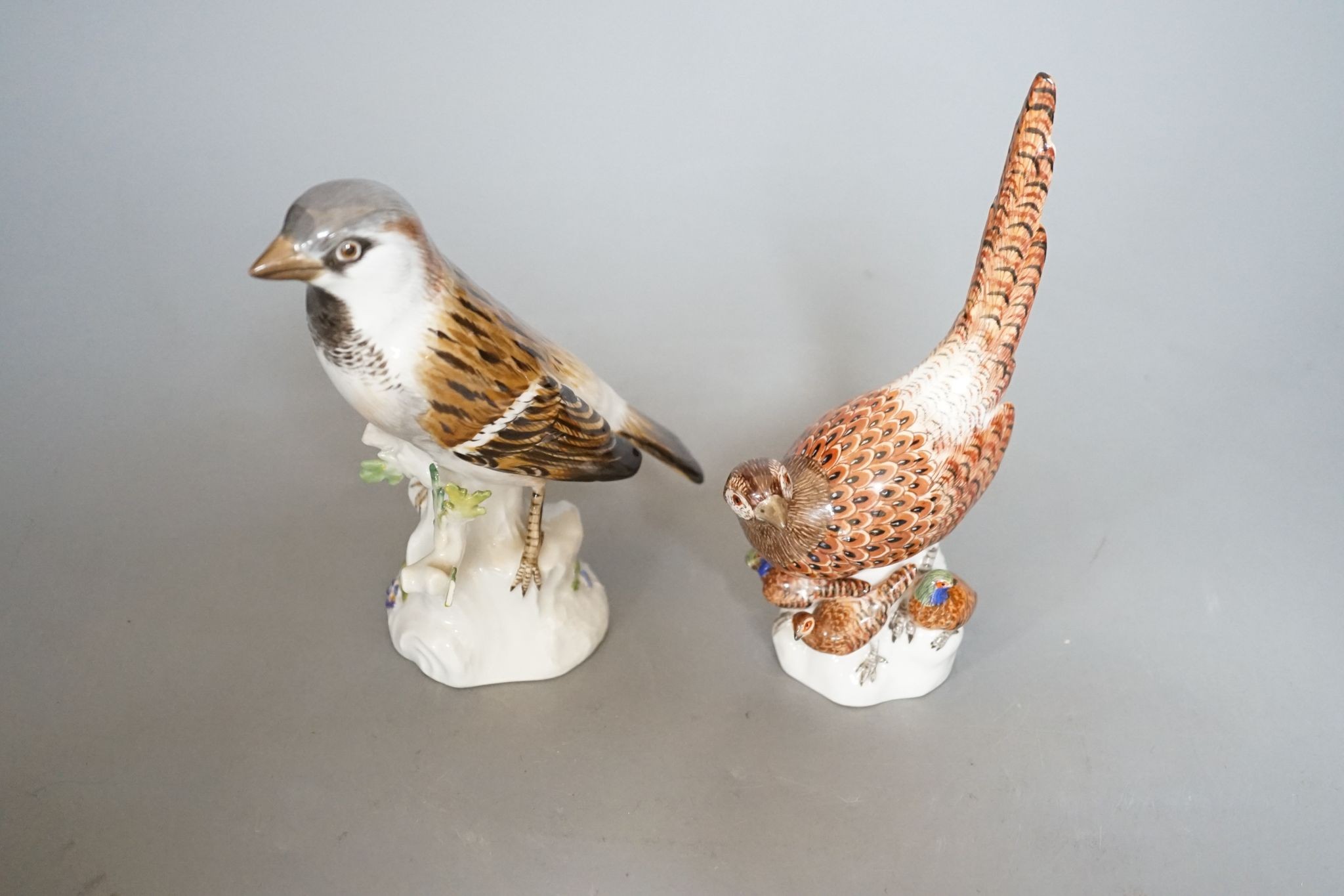 A Meissen porcelain pheasant and sparrow, incised numbers to base, 15cm